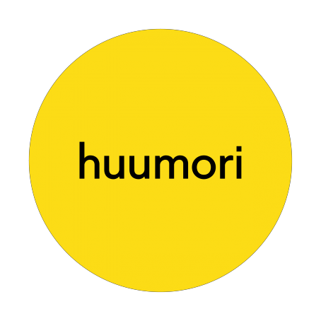 Keltaisen ympyrän sisällä lukee mustalla "huumori".